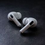 AirPods on Desk Thumbnail 150x150