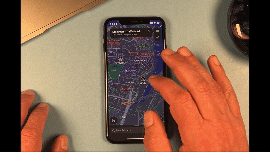 Gif showing how to zoom in and out of Apple Maps with one finger